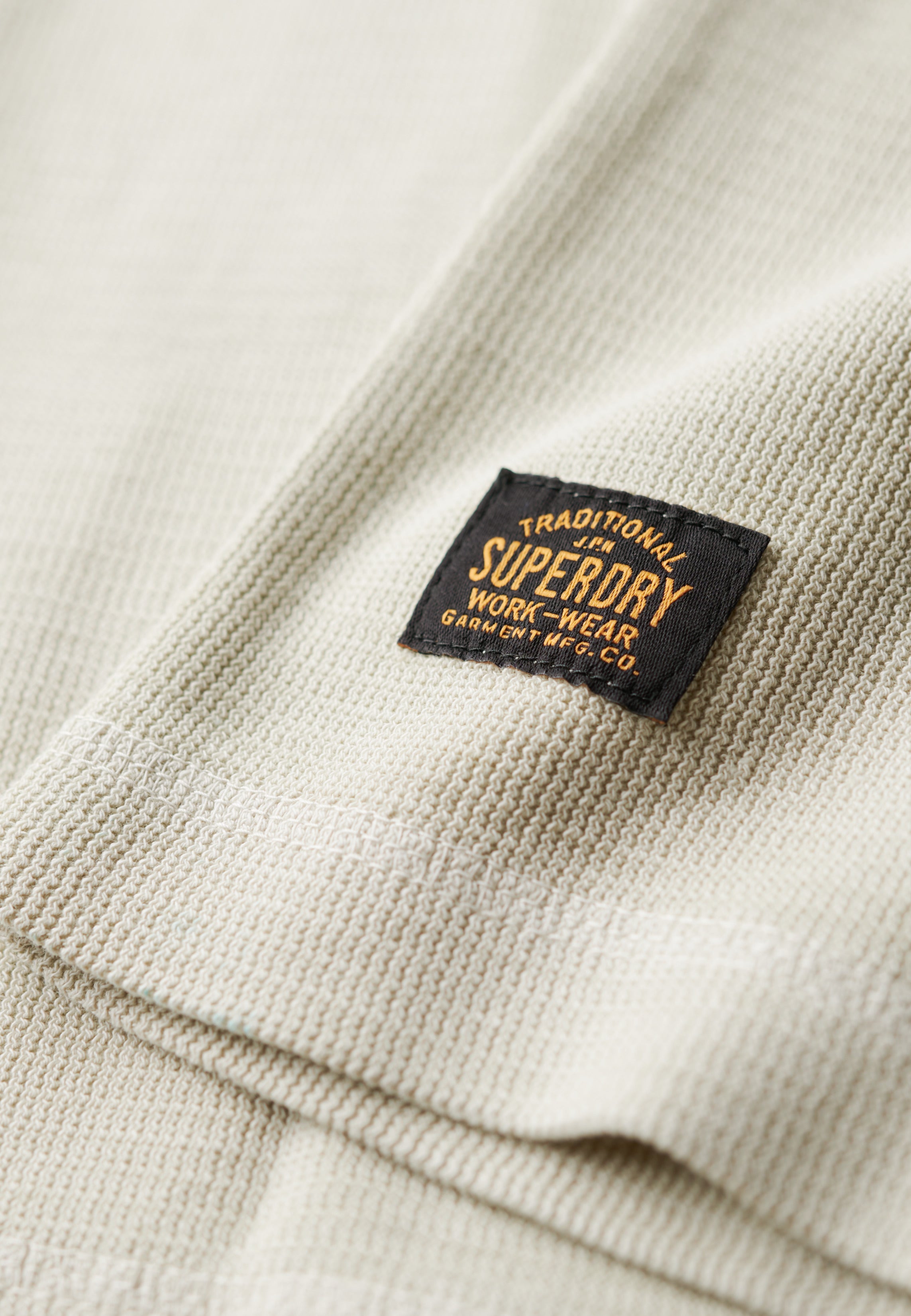 WAFFLE LONG SLEEVE HENLEY TOP